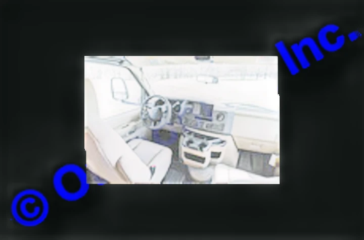 Inside an RV rental: driver's cockpit with steering wheel, dashboard, and passenger seat, looking out at a snowy landscape.. Nexus RV Triumph 2022