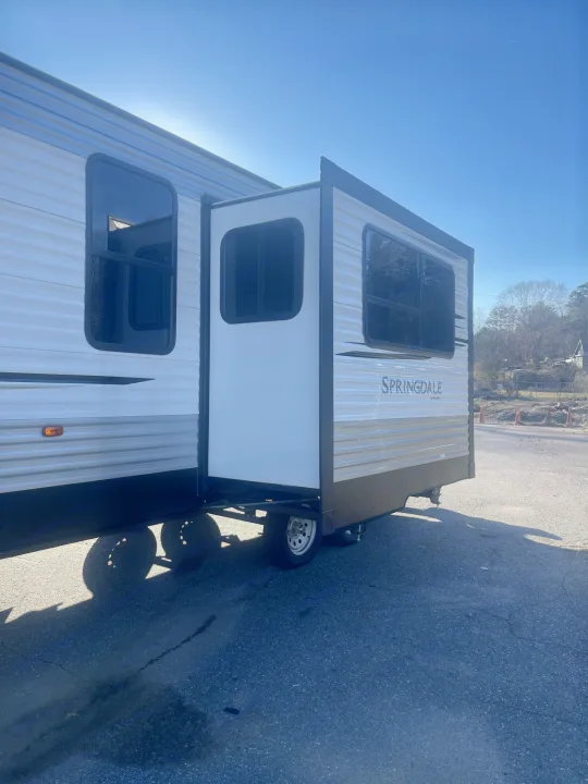 Spacious Springdale travel trailer with extended slide-out, ideal for your next RV rental adventure.. Keystone RV Springdale 2020