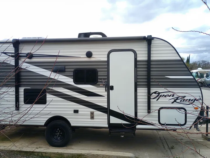 This sleek Open Range travel trailer is ready for your RV rental getaway. Ideal for camping and family road trips.. Highland Ridge RV Open Range 2022