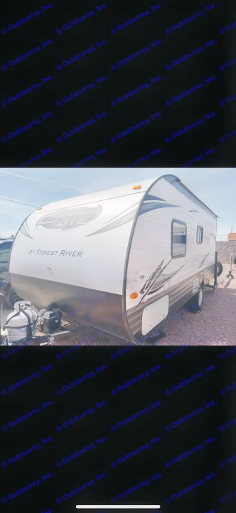 White Forest River Cruise Lite travel trailer RV rental, ready for camping adventures.. Forest River Salem Cruise Lite 2017