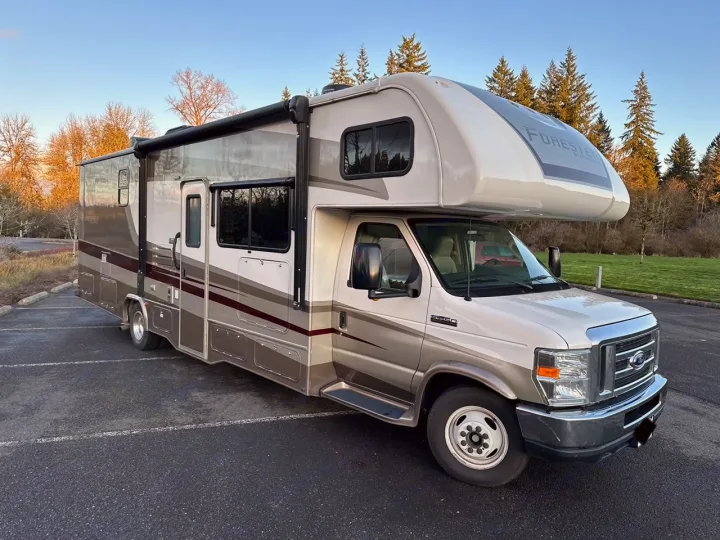 Discover this Class C motorhome rv rental. A beige and brown Forest River Forester, parked and ready for your travel adventure.. Forester Forester Motorhome 2020