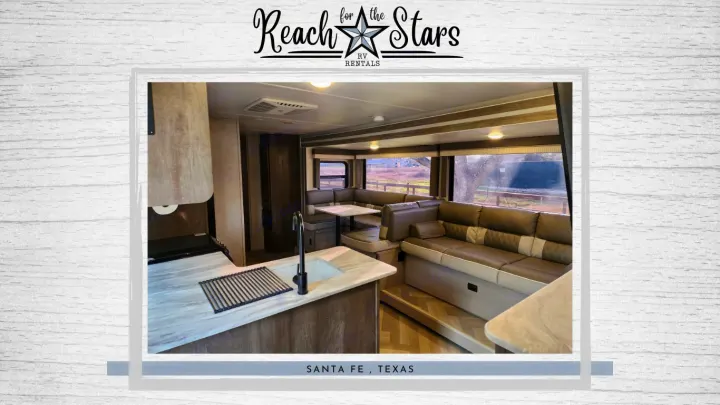Explore this spacious RV rental interior: kitchen, lounge, and dinette for comfortable travel from Santa Fe, TX.. Forest River Salem Cruise Lite 2021