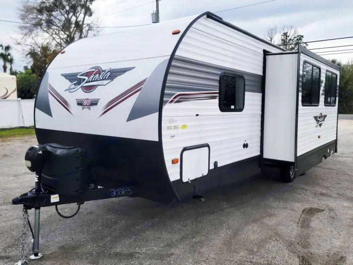 White Shasta travel trailer with slide-out, perfect for rv rental getaways. Over 80 years of heritage.. Forest River Shasta 2022