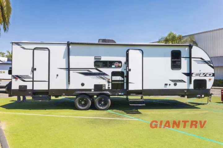 Looking for an RV rental? This modern white EVO travel trailer, with black accents, is ready for camping excursions.. Forest River Evo CSJT2650G 2023