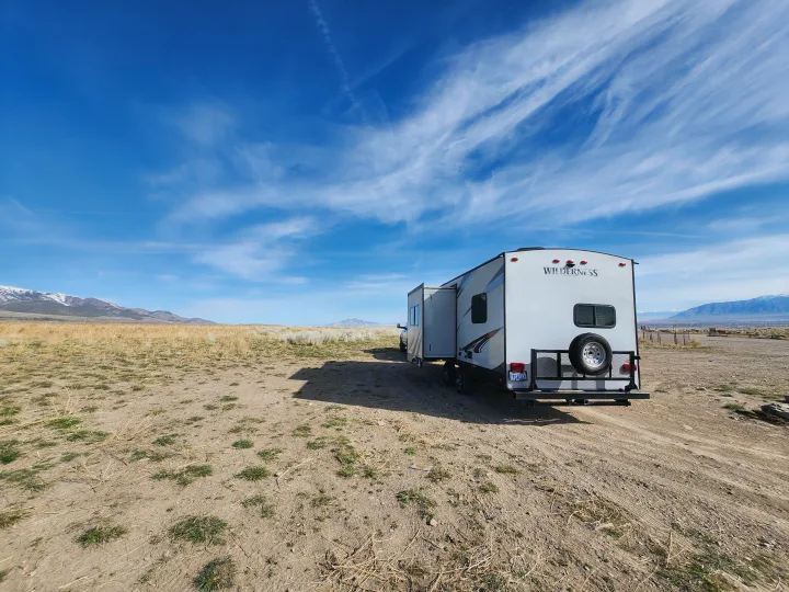 Spacious RV rental, a Wilderness travel trailer, parked for boondocking with beautiful mountain views.. Heartland Wilderness 2019