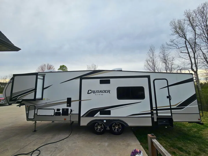 Spacious, modern RV interior with full kitchen and living area, perfect for your next rv rental adventure.. Crusader Lite 2022
