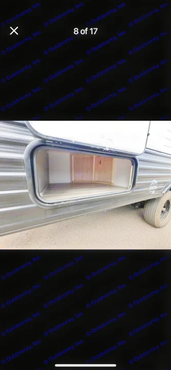 RV rental: Spacious pass-through storage of a travel trailer, open to show its deep, clean interior. Ideal for gear.. Coachmen Clipper 2024