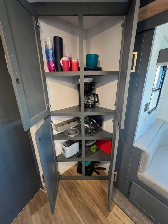 Maximize space in your RV rental kitchen with smart corner storage for essentials like coffee maker, toaster, and dishes.. Keystone Bullet Crossfire 4YDTBLN25RD430760 2024