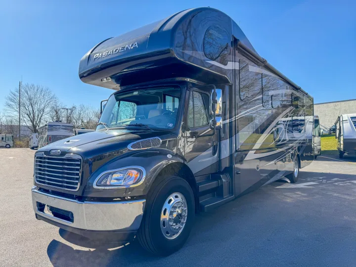 A large, black Pasadena Super C motorhome with chrome accents. Your perfect RV rental for travel awaits.. Thor Motor Coach Pasadena  Super-C 2023
