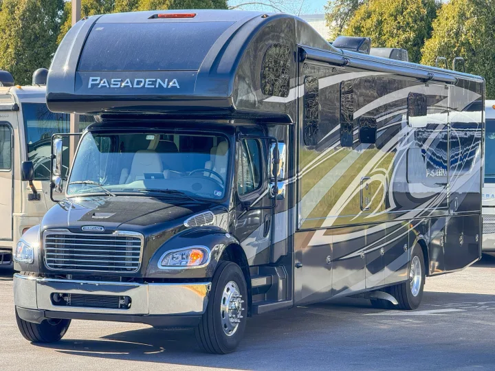A striking black Freightliner Pasadena Super C motorhome. Explore in luxury with this RV rental.. Thor Motor Coach Pasadena  Super-C 2023
