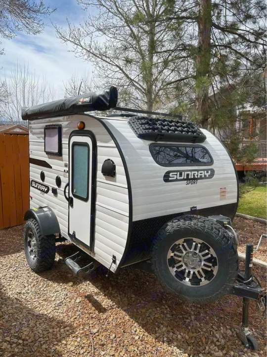Rugged SunRay Sport teardrop camper, an ideal rv rental for off-road adventures and remote camping trips.. Sunset Park RV SunRay 2020