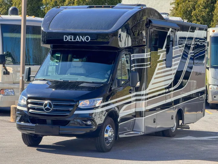 A black Delano Class C RV, built on a Mercedes-Benz Sprinter chassis, featuring modern graphics, for your next rv rental.. Thor Motor Coach Delano 2022