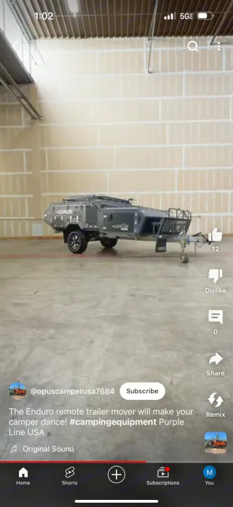 This rugged Opus off-road camper trailer, ideal for RV rental, offers adventure camping. See its sleek design indoors.. OPUS Opus4 2024