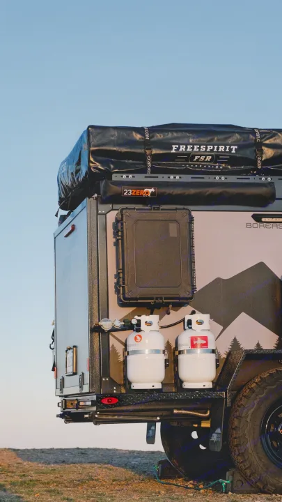 This off-road RV rental trailer is equipped with a rooftop tent, dual propane tanks, and storage for your outdoor adventures.. Boreas XT 2023