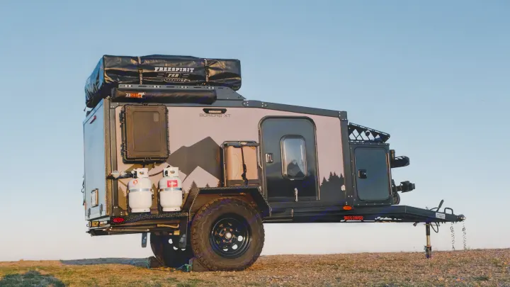 Rugged Boreas XT overland trailer, ideal for RV rental adventures. Features roof-top tent & propane for camping.. Boreas XT 2023