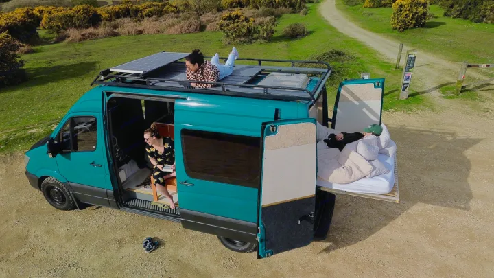 Experience van life with this rv rental! People relax on the roof, read inside, or sleep on the pull-out bed in nature.. Mercedes-Benz Sprinter 2016