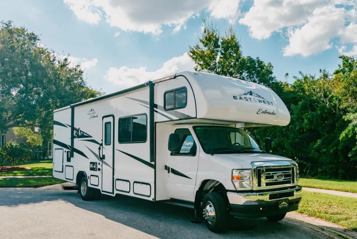 A pristine white East to West Entrada Class C motorhome, perfect for your next RV rental adventure.. East to West Entrada 2024