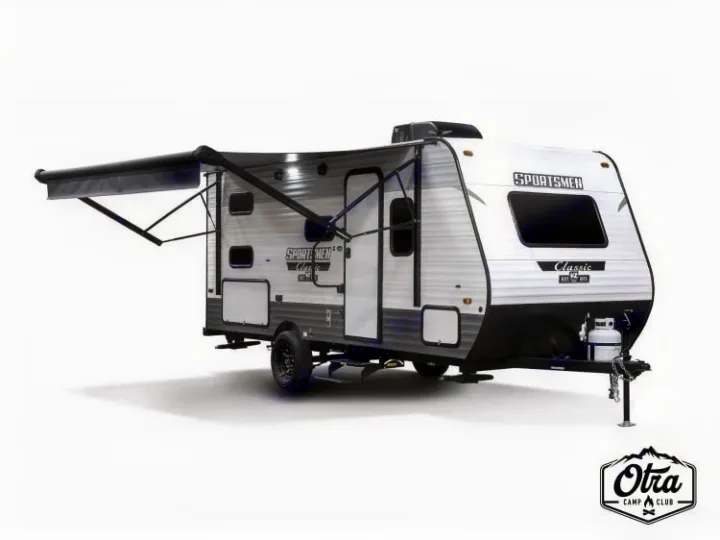 Ready for adventure? This white and grey travel trailer with an extended awning is ideal for your rv rental.. KZ SPORTSMEN CLASSIC 191BHK 2024