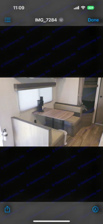 Cozy RV rental dinette with window, table, and seating. Includes coffee maker & fire extinguisher for your trip.. Gulf Stream Enlighten 2022