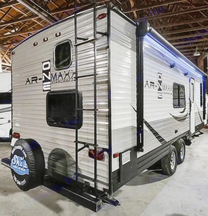 This grey Starcraft AR-ONE MAX RV, with rear ladder & lighted awning, is ideal for RV rental adventures.. Starcraft AR-One Maxx 2017