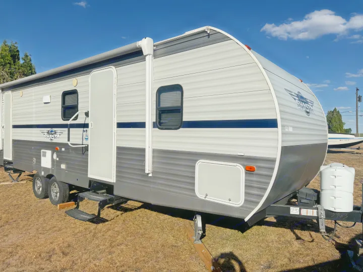Light & dark gray Shasta travel trailer, ready for your next RV rental adventure or outdoor getaway.. Shasta 26db 2020