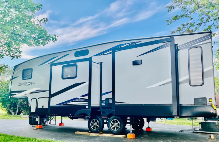 This large, modern RV rental, an "Arctic Wolf" travel trailer, is parked & ready for your outdoor adventures.. Forest River Cherokee Arctic Wolf 2021