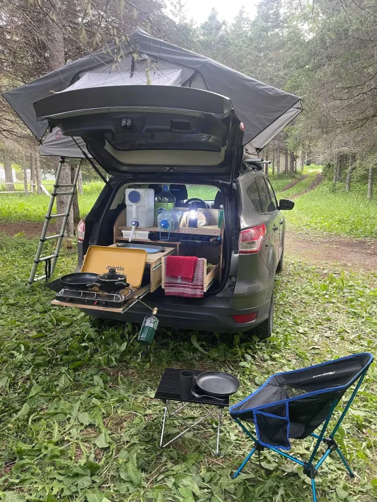 Car camping setup with rooftop tent & custom outdoor kitchen. Perfect for an RV rental adventure!. Ford Escaper 2013