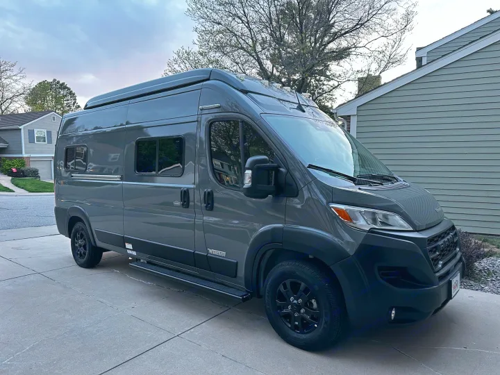 Modern gray Winnebago camper van, ideal for your next RV rental adventure.. Winnebago Solis 2023