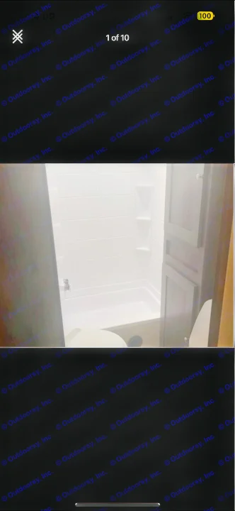 RV rental bathroom interior: compact shower, tub, toilet, and wood storage cabinet.. Cruiser RV MPG Ultra Lite 2019