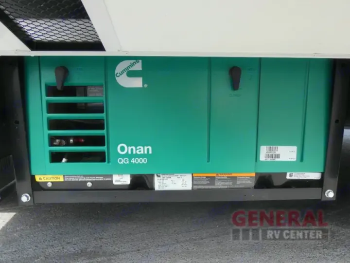 Green Cummins Onan QG 4000 generator, vital power source for your RV rental adventures.. Thor Quantum SE 2022