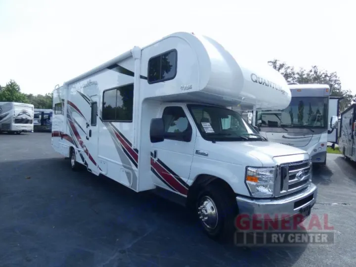 A white Quantum Class C RV with modern red/grey graphics. Perfect for RV rental, this motorhome is ready for adventure.. Thor Quantum SE 2022