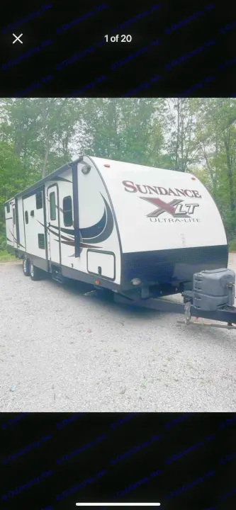 Bright white Sundance XLT Ultra-Lite travel trailer, perfect for your next RV rental adventure.. Heartland RVs Sundance XLT 2016
