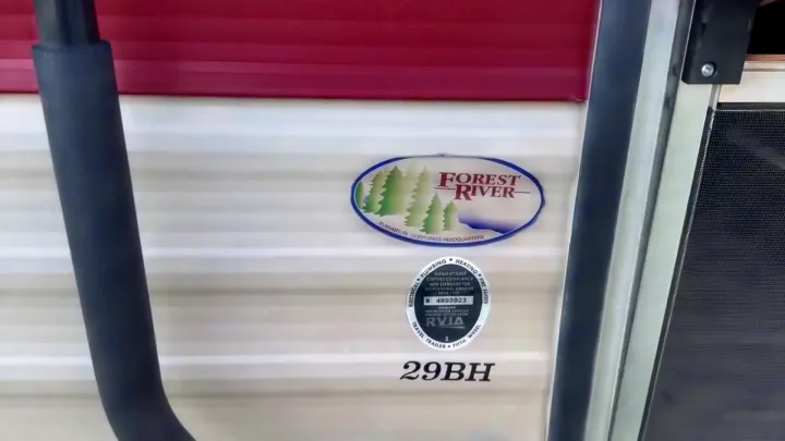 This RV rental travel trailer shows its Forest River brand, RVIA seal, and 29BH model. It's ready for adventure!. Forest River Cherokee Grey Wolf 2019