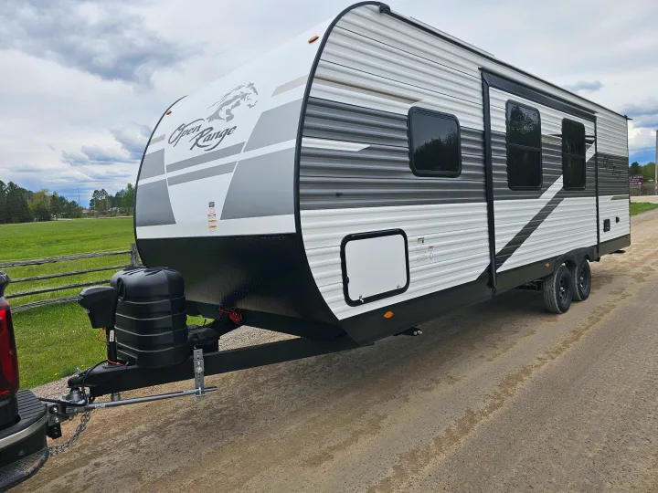 Looking for an RV rental? This "Open Range" travel trailer is ready for adventure, featuring dual axles & ample space.. Highland Ridge RV Open Range 2024