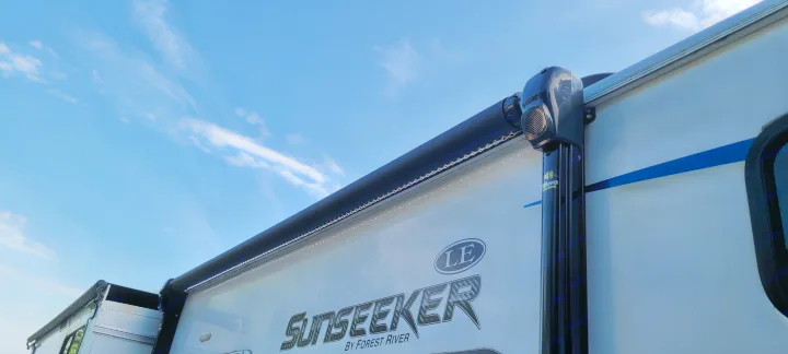 Bright LED lights illuminate the awning of this Sunseeker RV, perfect for an rv rental adventure. Includes Solera speakers.. Forest River Sunseeker LE 2020