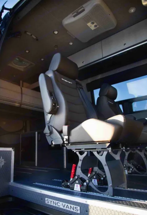 Explore a premium rv rental van's interior. Features adaptable Scheel-mann seating on floor tracks, overhead AC, and custom build.. Mercedes Sprinter 2020