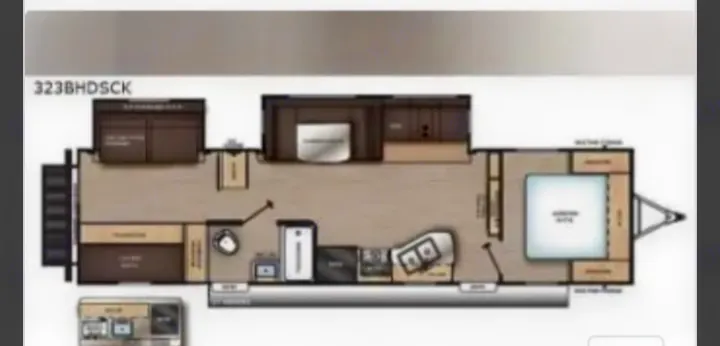 This RV rental floor plan shows the 323BHDSK model's interior layout, featuring a front bedroom, kitchen, and rear bunkhouse.. Coachmen Catalina Legacy 323BHDSCK 2022