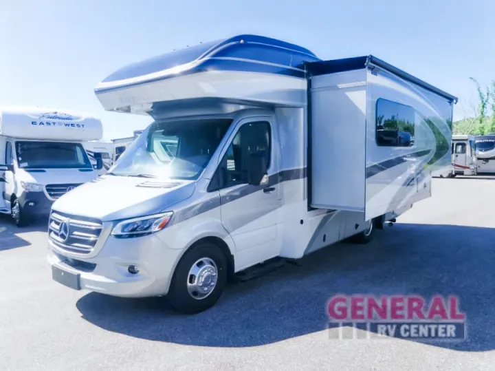 This sleek silver and white Mercedes-Benz Entegra RV rental, a motorhome with a slide-out, is ready for adventure.. Entegra Coach Qwest 24L 2024