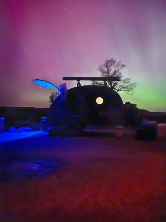 Unique RV rental under vibrant Northern Lights. Experience celestial views & unforgettable night adventures!. Bean Trailer Bean Trailer Trailer 2024