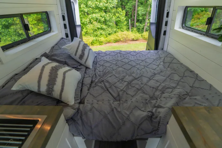 The table can be slid into the center of the benches, then with the addition of two extra fill pieces you can easily convert the dinette into a full size bed! . Mercedes-Benz Sprinter 2020