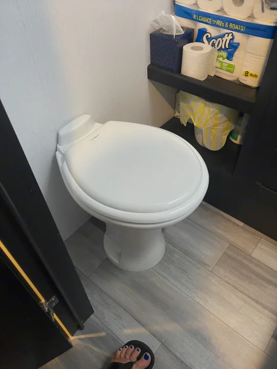 Compact RV rental bathroom with Dometic toilet & essentials. Perfect for your next road trip!. Coachmen 292BHDS FREEDOM EXPRESS LIBERTY EDITION 2022