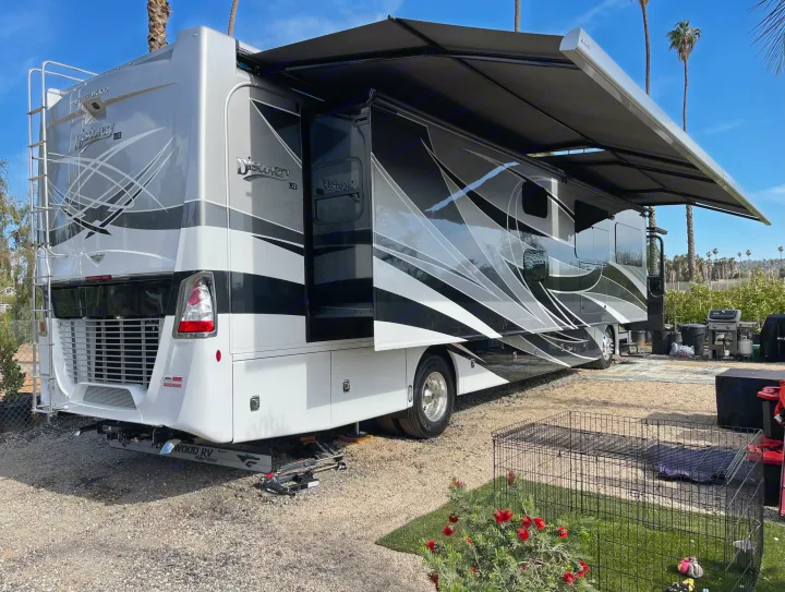 This sleek Fleetwood Discovery LXE motorhome, with its extended awning, makes a great rv rental for resort camping.. Fleetwood Discovery 2021