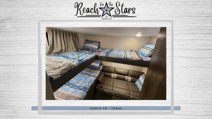 This RV rental bunkhouse offers multiple beds and a sofa sleeper, ideal for families. Spacious interior in Santa Fe, Texas.. Forest River Salem Cruise Lite 2021