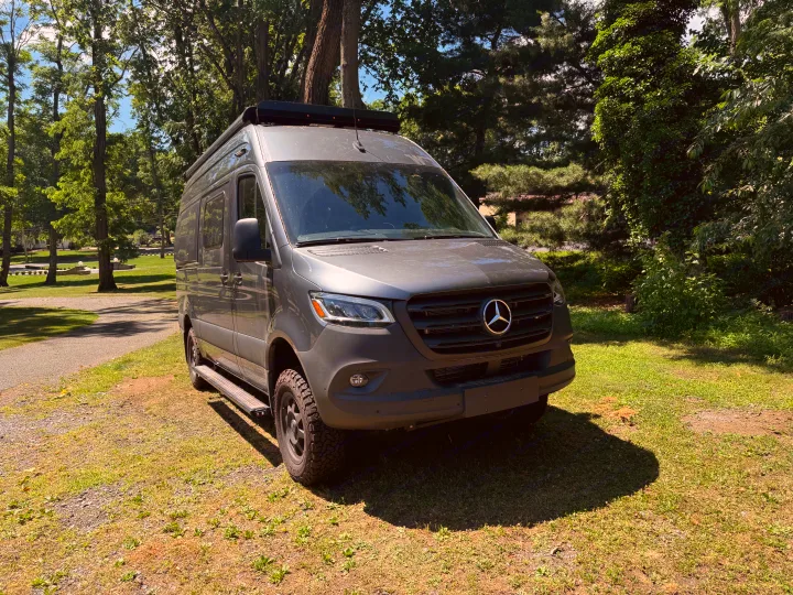 Modern gray Mercedes-Benz Sprinter camper van, perfect for rv rental trips.. Winnebago Revel 2023