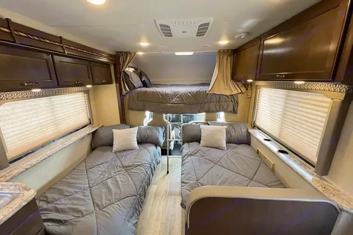 RV rental: Interior view showing an over-cab bunk and two twin beds on the main floor.. Thor Motor Coach Freedom Elite 2017