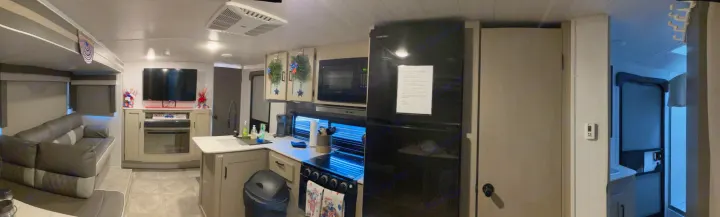 RV rental interior: panoramic view of kitchen, living room, and more. Ready for your adventure.. Forest River Salem Cruise Lite 2023