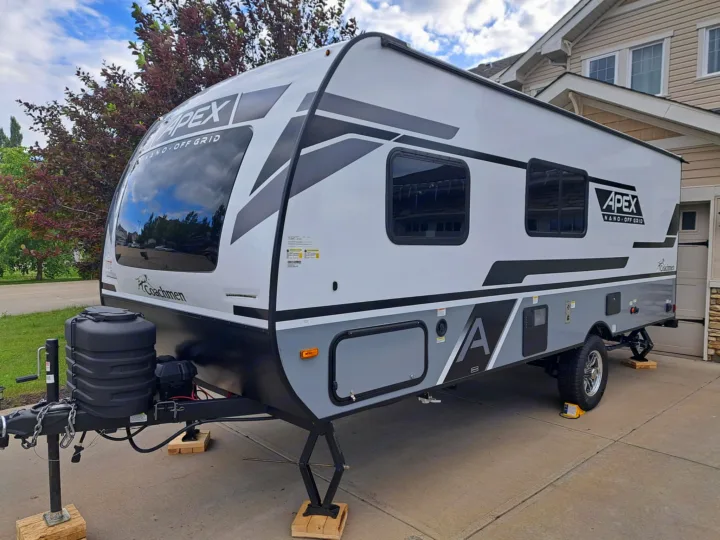 Prepare for adventure with this white & grey Apex Nano Off Grid travel trailer, an ideal choice for an rv rental.. Coachmen Apex Nano 2024
