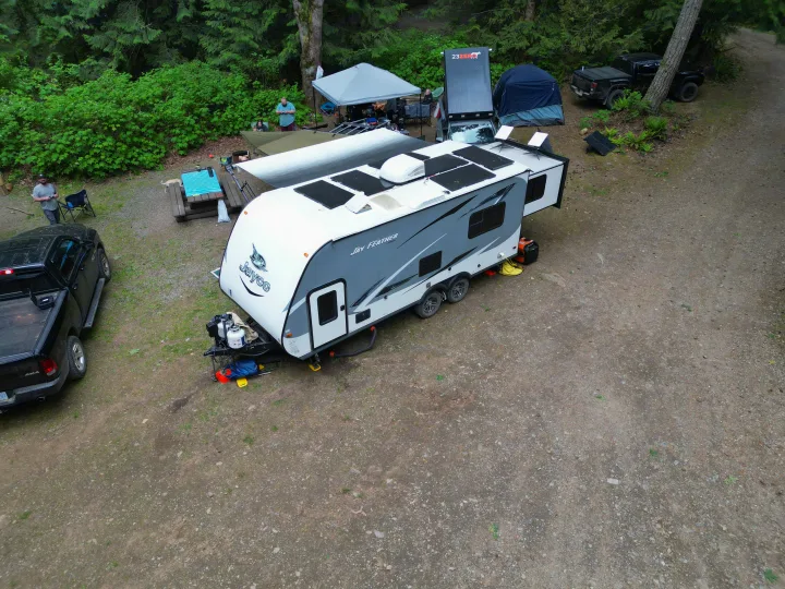 Spacious Jayco Feather RV rental set up for comfortable camping. Enjoy nature with solar power & full outdoor amenities.. Jayco X213 2016
