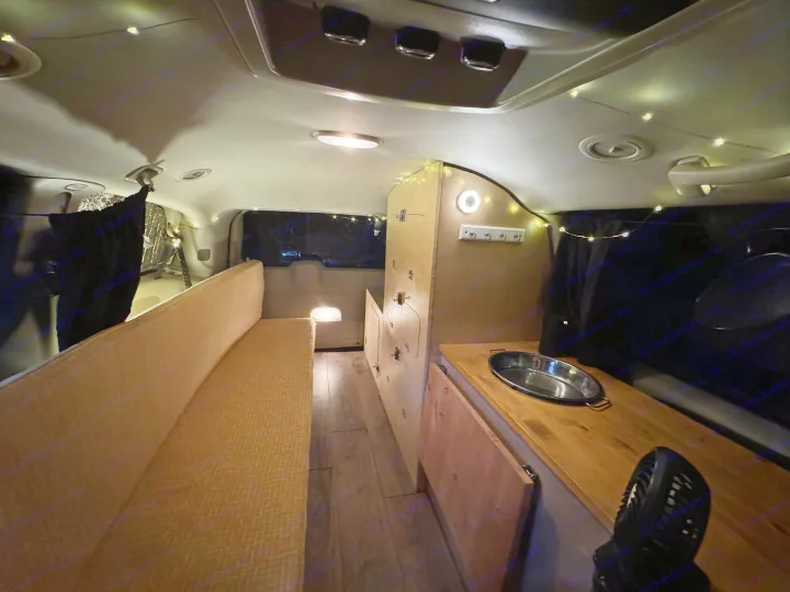 Step inside this cozy RV rental! Custom van conversion with bench seating, kitchen, and ambient lighting.. Dodge Grand Caravan 2013