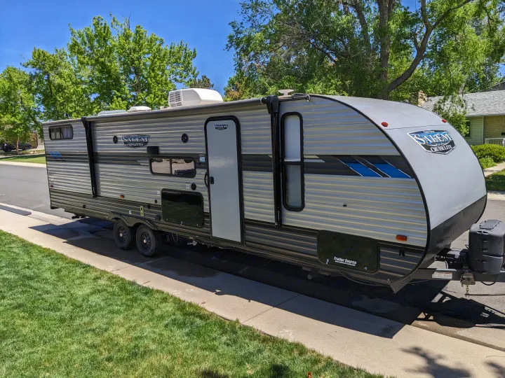 This grey travel trailer, a Salem Cruise Lite, looks ready for an RV rental adventure.. Forest River Salem Cruise Lite 2022